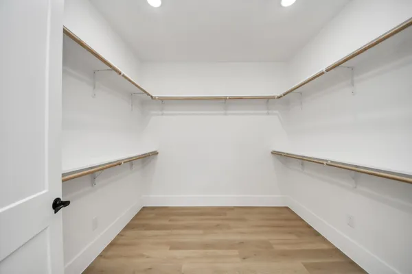 a view of an empty walk in closet
