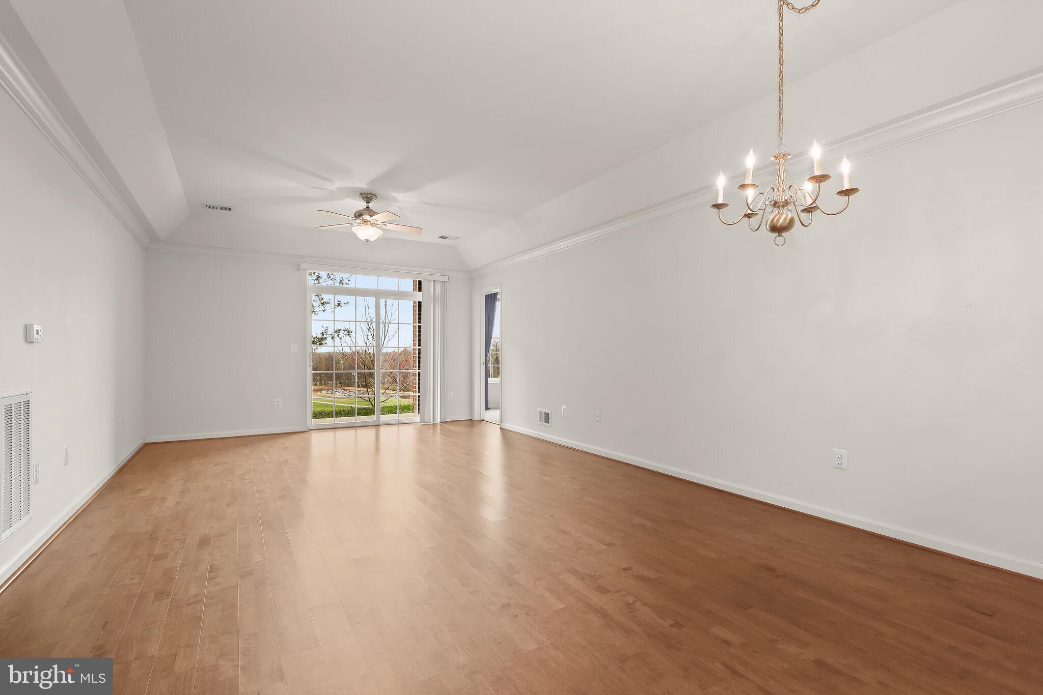 7315 Brookview Road, Unit 104 Elkridge, MD 21075 - Photo 47 of 48 Sun filled open floor plan with living & dining...