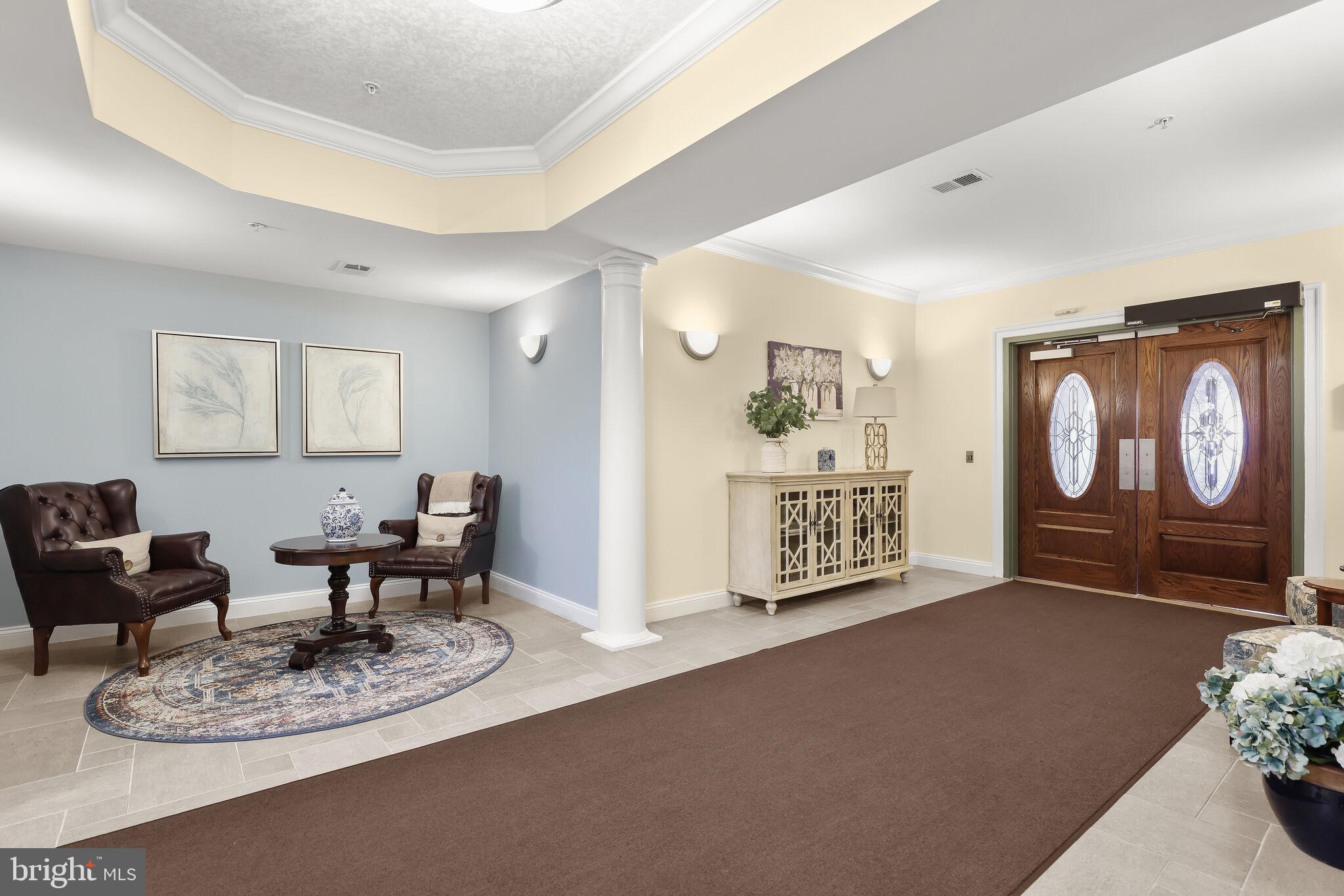 7315 Brookview Road, Unit 104 Elkridge, MD 21075 - Photo 6 of 48 Beautiful lobby entrance