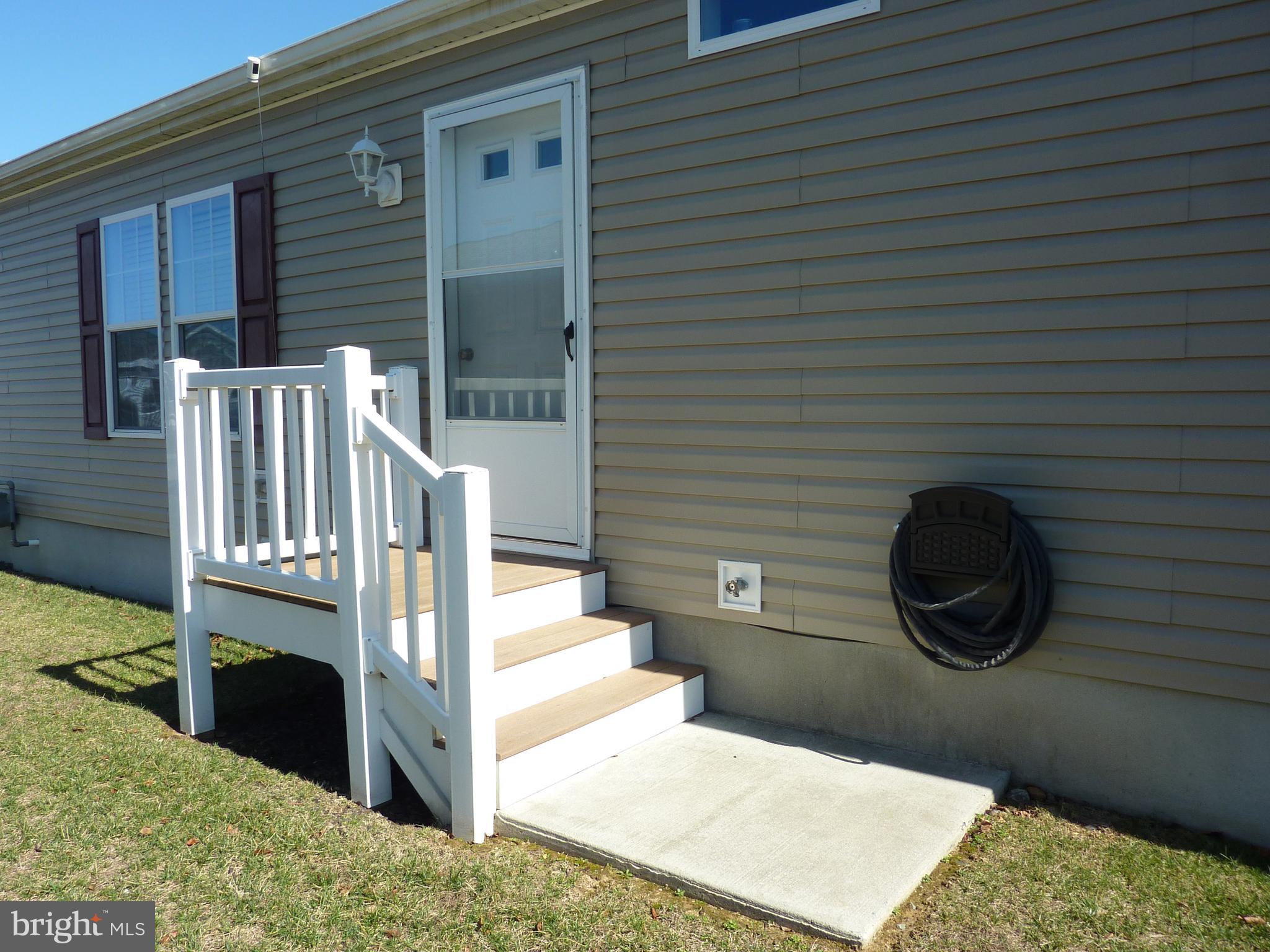 1223 Media Road Smyrna, DE 19977 - Photo 40 of 41 Side Entrance - Storm Door & Composite Stairs