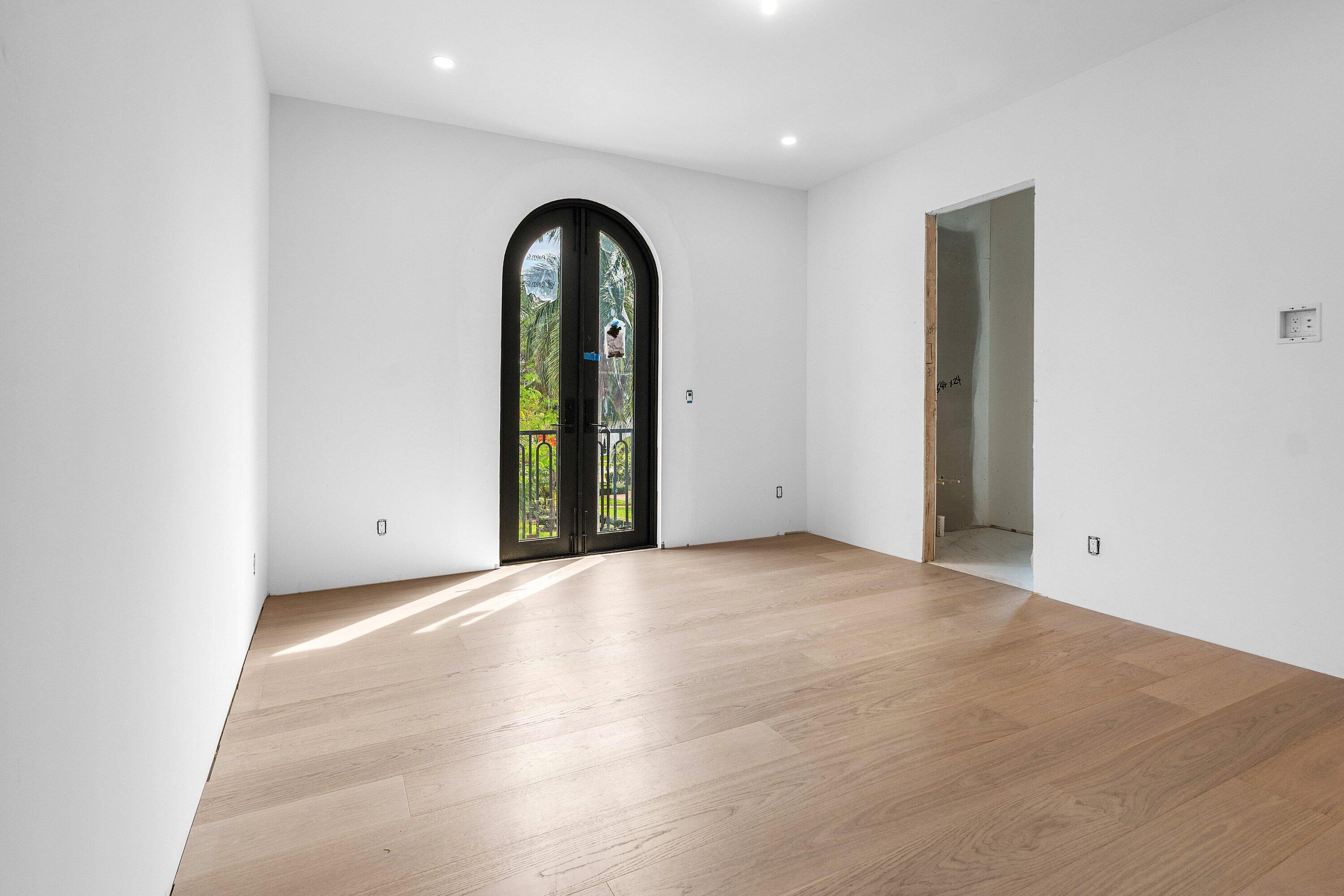 298 Northeast 8th Street Boca Raton, FL 33432 - Photo 47 of 86 an empty room with entrance and door