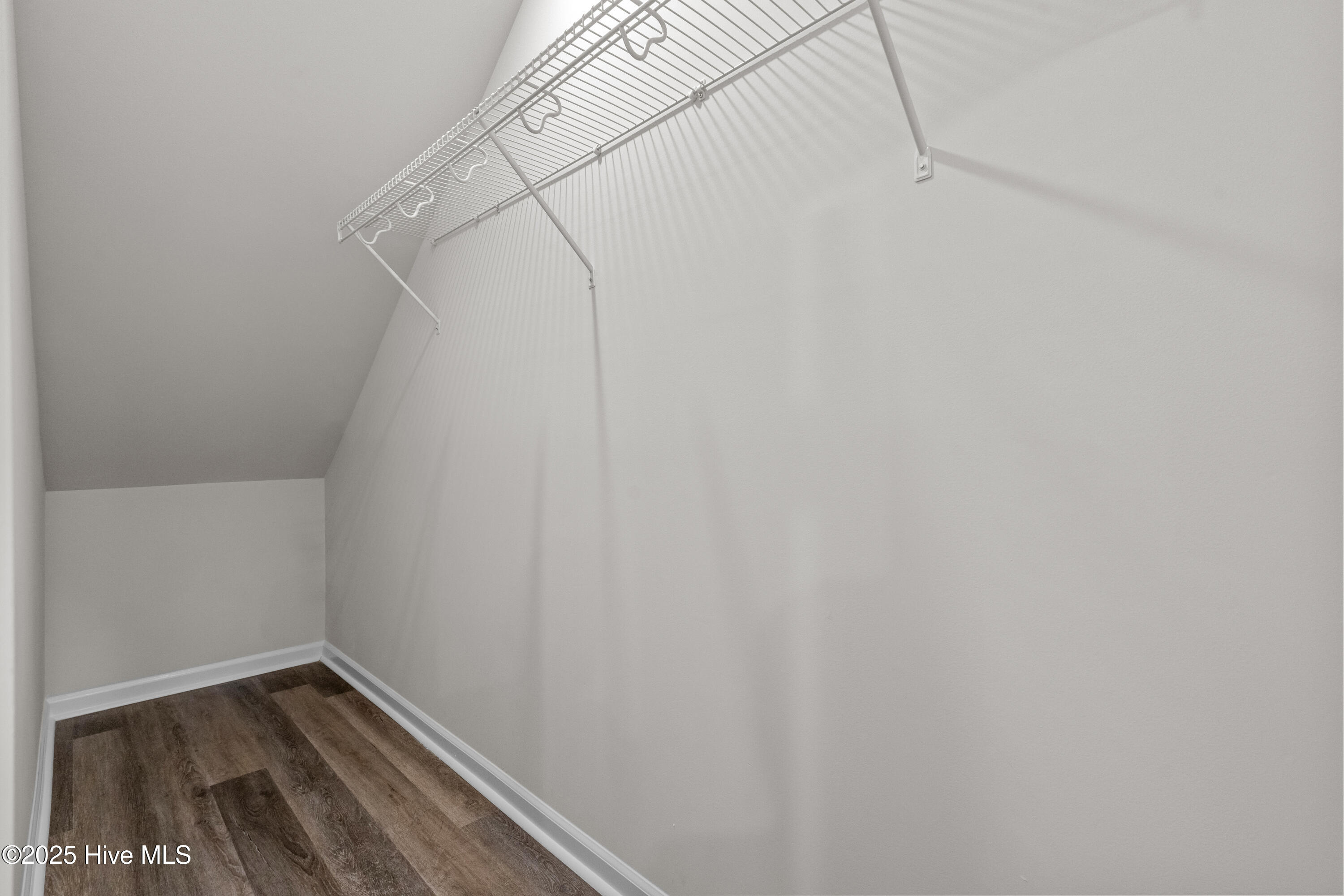 826 Palm Frond Way Calabash, NC 28467 - Photo 11 of 35 Open storage space under the stiars