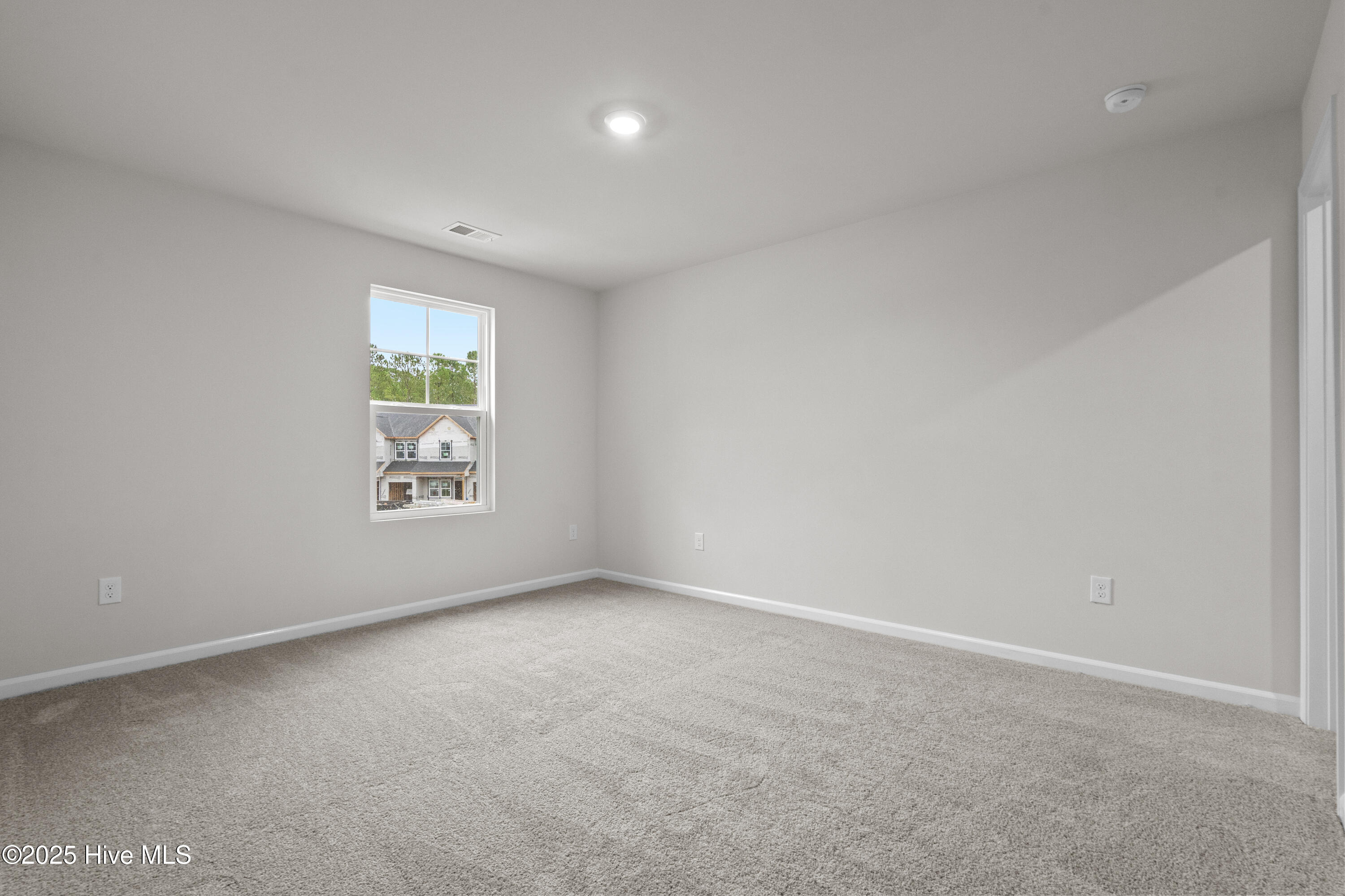 826 Palm Frond Way Calabash, NC 28467 - Photo 17 of 35 Bedroom 3 in front of the home