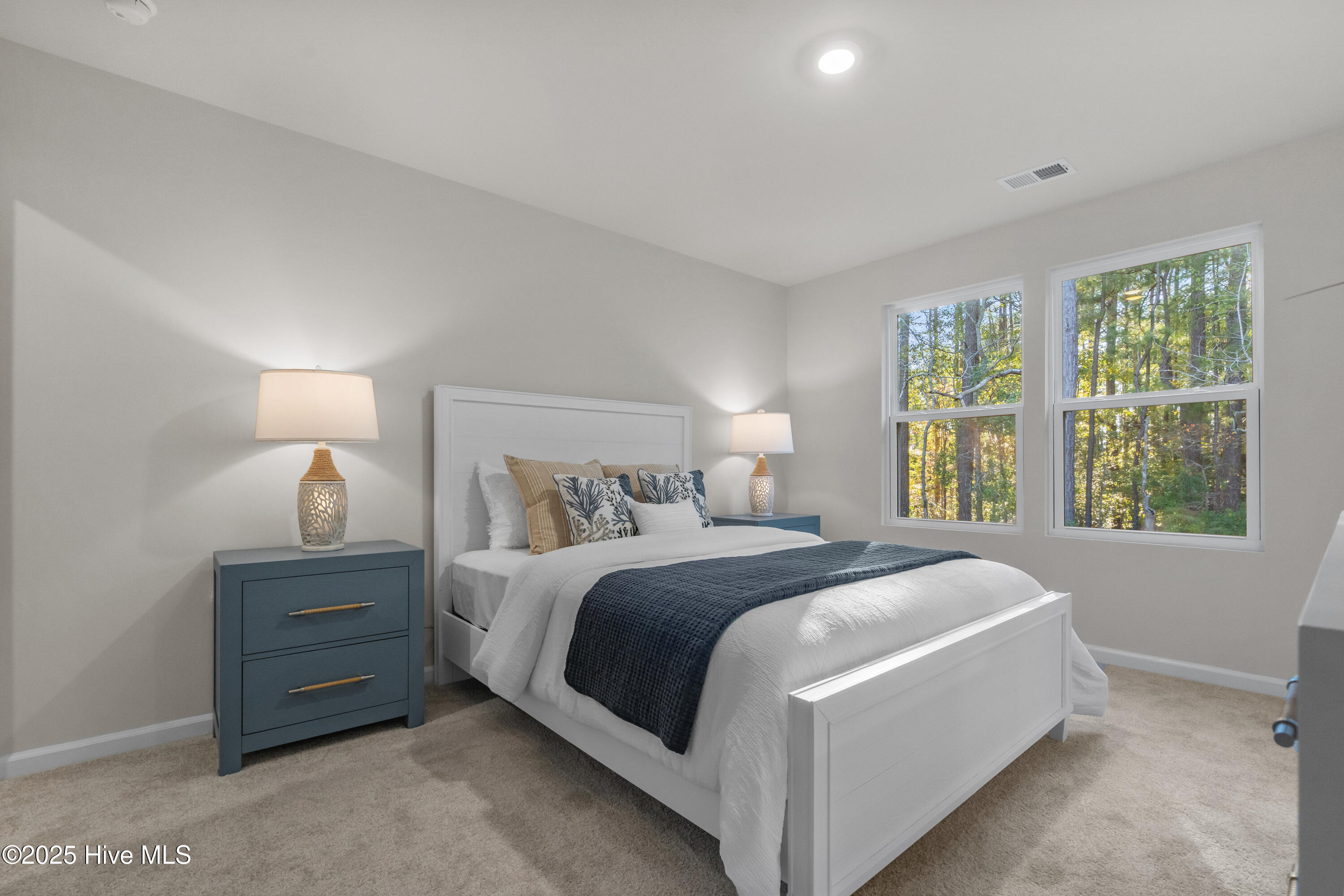 826 Palm Frond Way Calabash, NC 28467 - Photo 28 of 35 Bedroom 3 upstairs of our decorated model, not this home