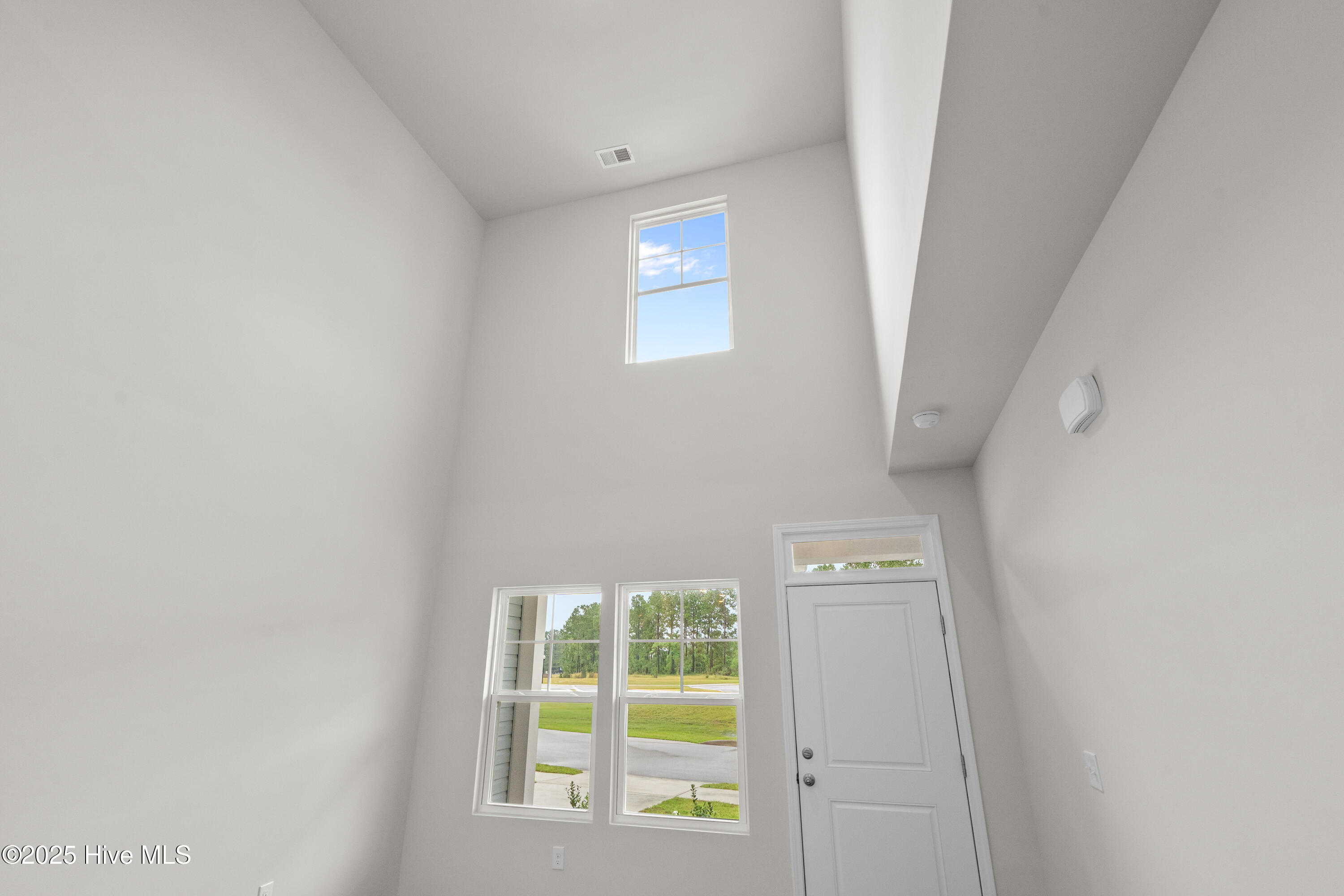 826 Palm Frond Way Calabash, NC 28467 - Photo 9 of 35 Vaulted ceiling in gathering space