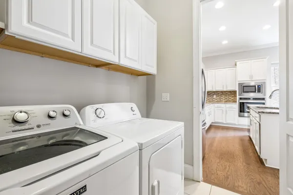 a view of kitchen and washer