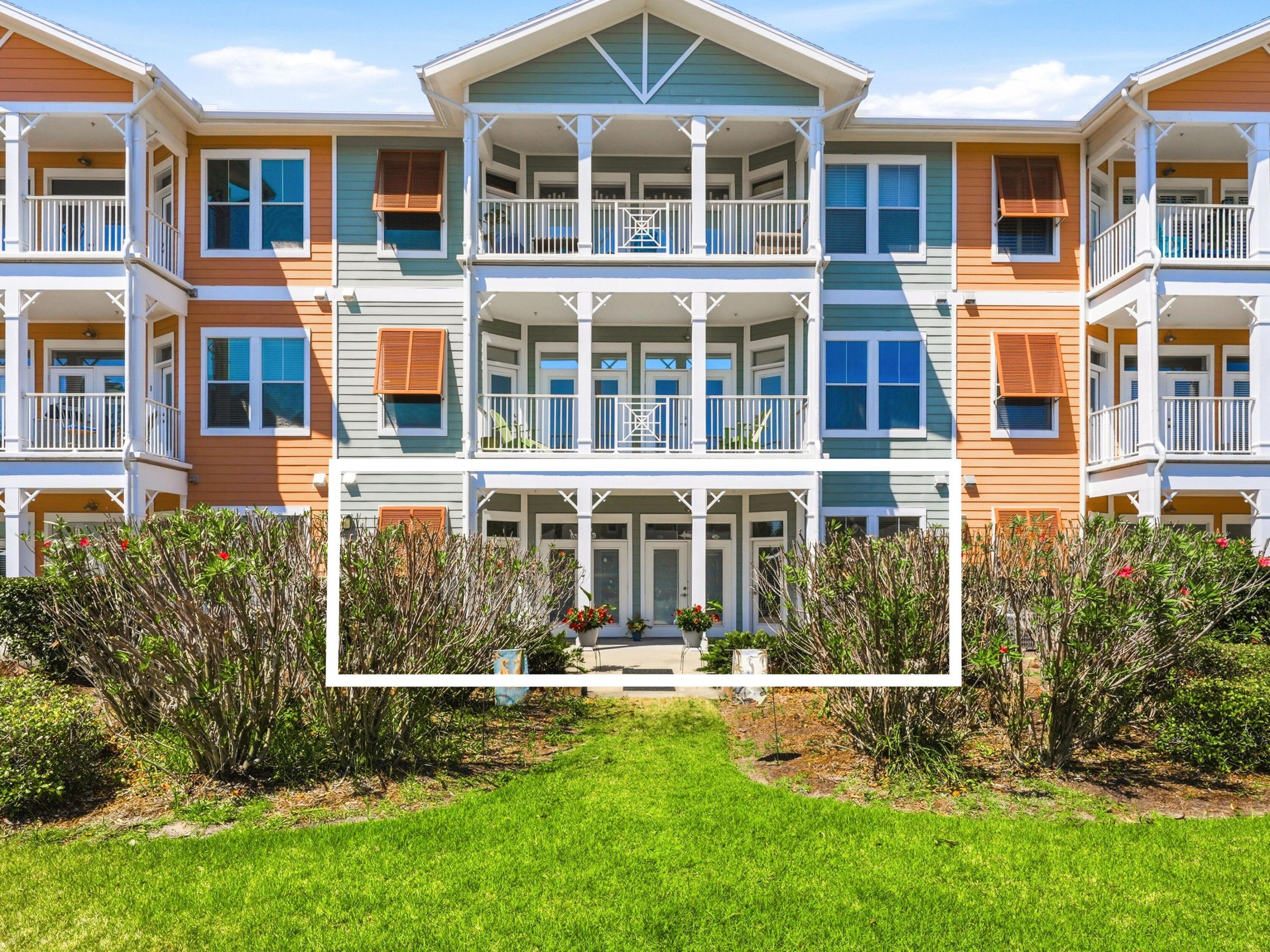 8700 Front Beach Road, Unit 7107 Panama City Beach, FL 32407 - Photo 54 of 54 front view of a building with a yard