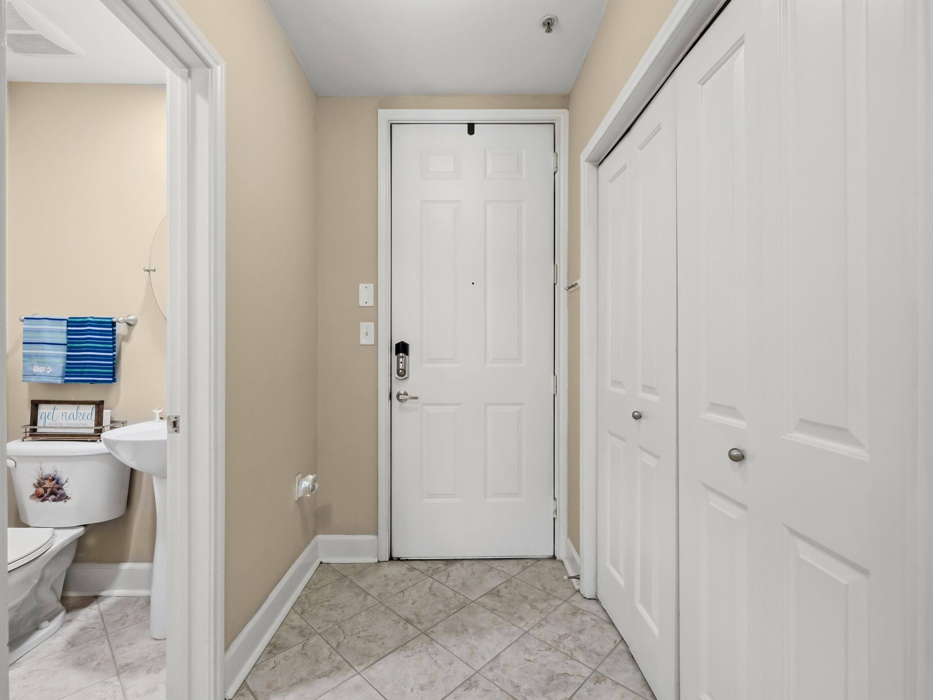 8700 Front Beach Road, Unit 7107 Panama City Beach, FL 32407 - Photo 10 of 54 a view of a bathroom with a toilet