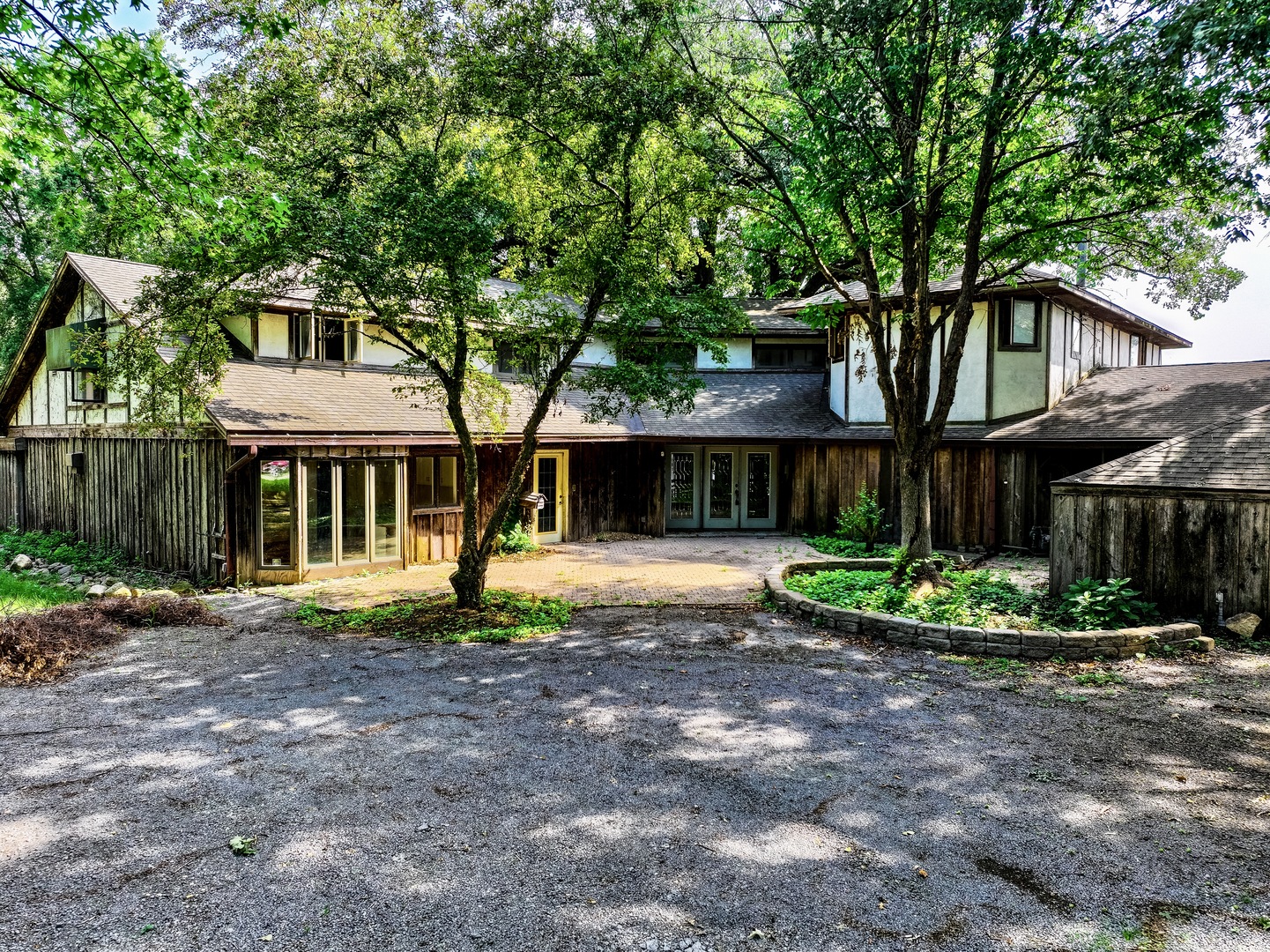 2351 River Road Kankakee, IL 60901 - Photo 121 of 122 a front view of a house with a yard and potted plants
