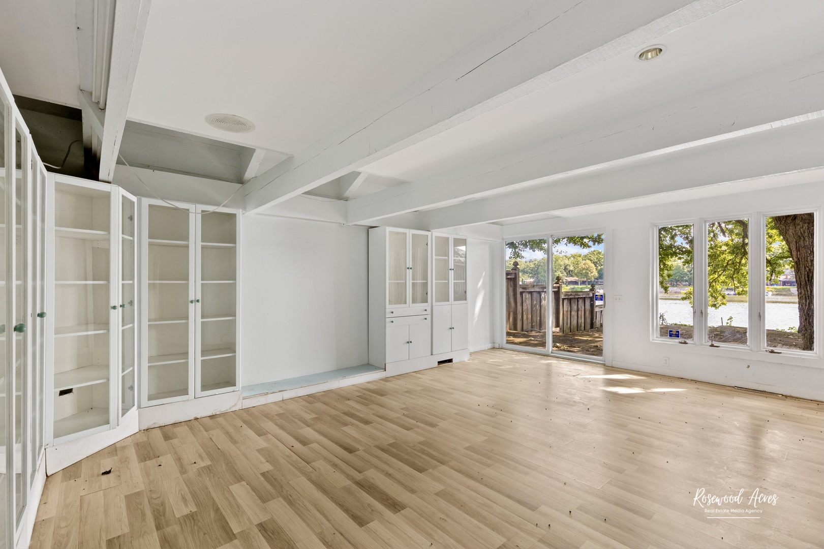 2351 River Road Kankakee, IL 60901 - Photo 61 of 122 a view of an empty room with wooden floor and a window