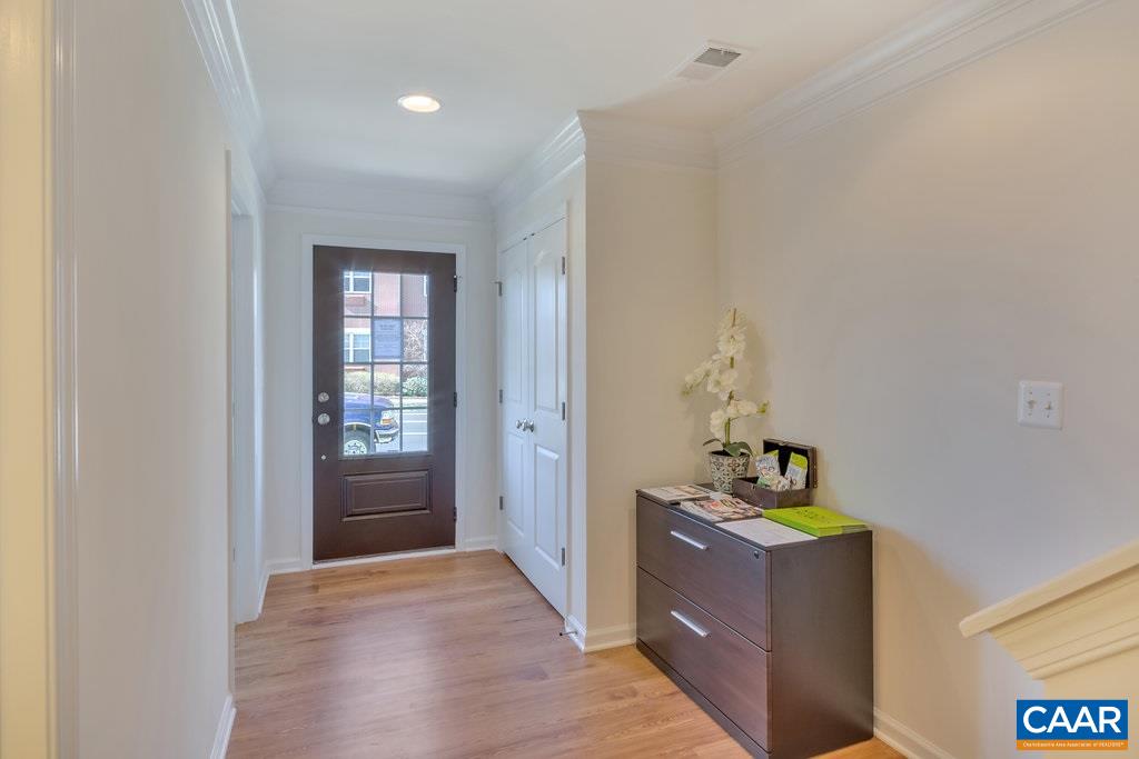 2172 Avinity Loop Charlottesville, VA 22902 - Photo 2 of 19 a view of an entryway with wooden floor