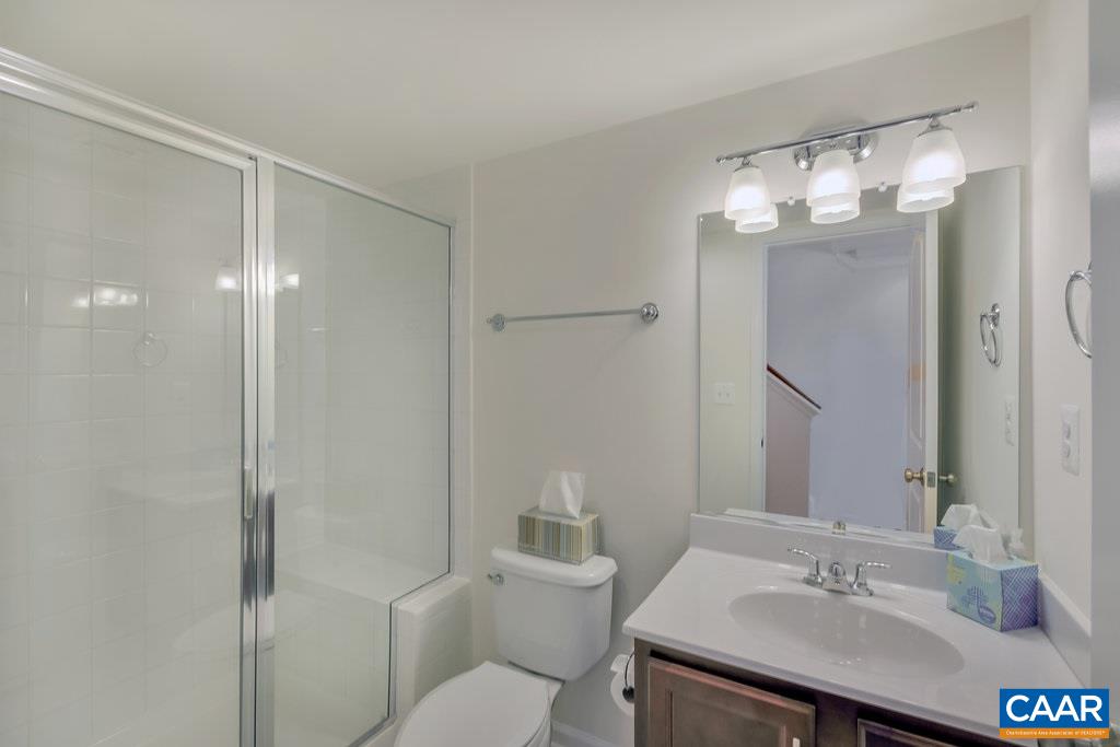 2172 Avinity Loop Charlottesville, VA 22902 - Photo 3 of 19 a bathroom with a sink toilet and shower
