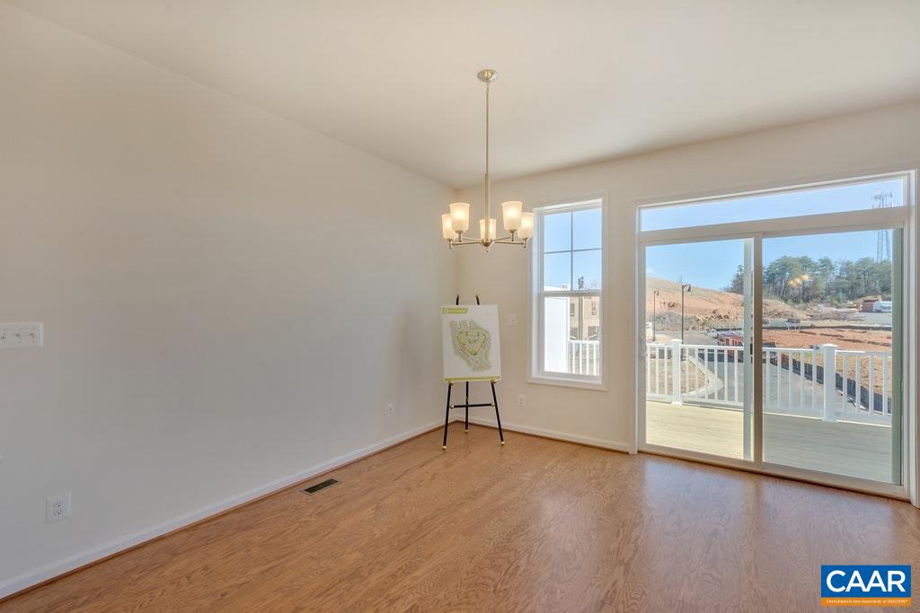 2172 Avinity Loop Charlottesville, VA 22902 - Photo 7 of 19 a view of an empty room with a window