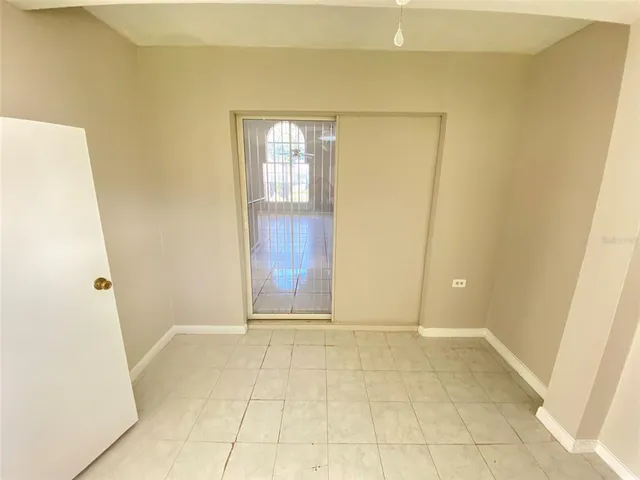 a view of a room with an empty door