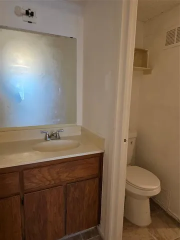 a bathroom with a sink and mirror