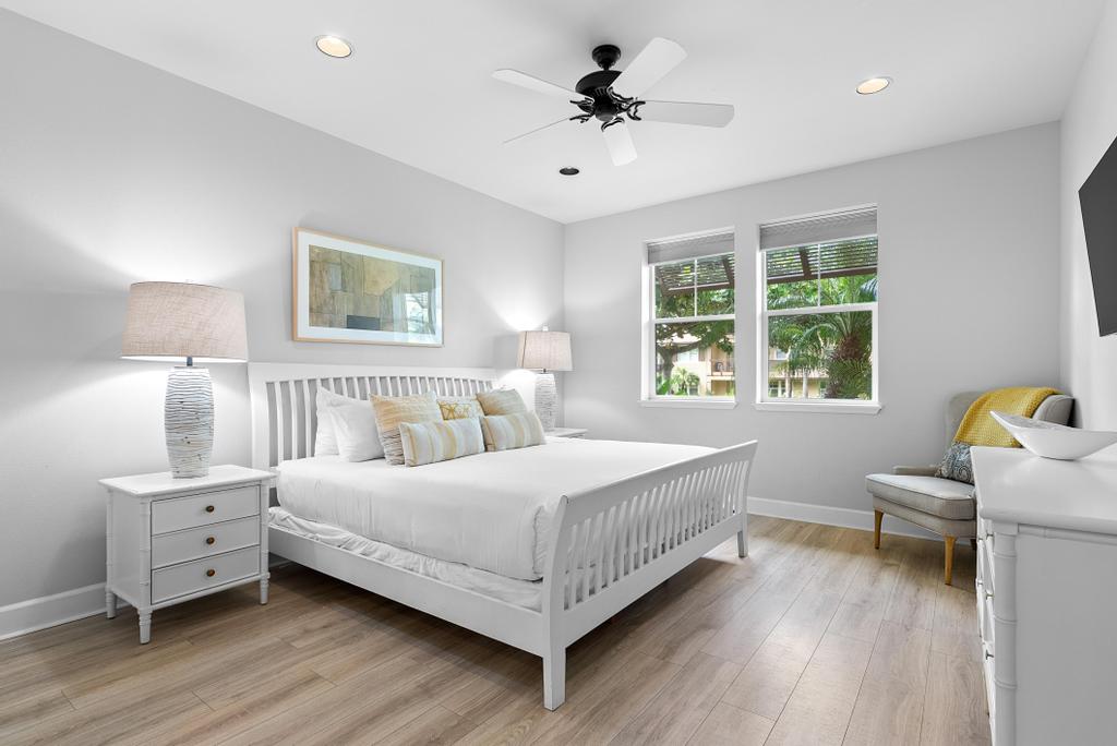 69-1033 Nawahine Place, Unit 22H Waikoloa, HI 96738 - Photo 11 of 29 a bedroom with a bed and a window