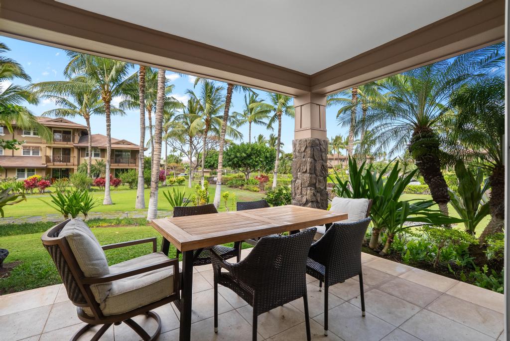 69-1033 Nawahine Place, Unit 22H Waikoloa, HI 96738 - Photo 10 of 29 a view of a patio with a table chairs and a backyard