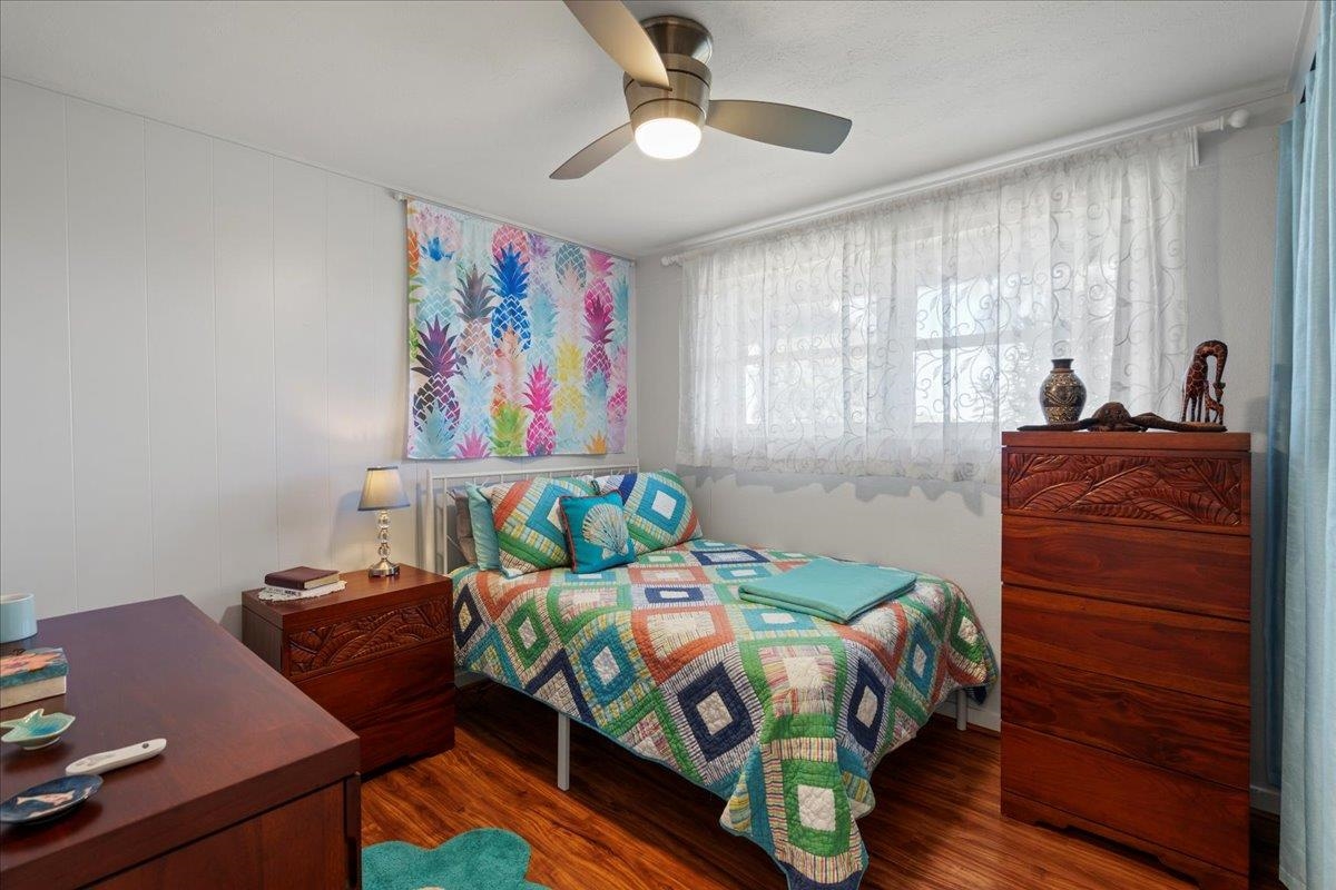 110 Kahiapo Place Haiku, HI 96708 - Photo 17 of 36 a bedroom with a bed and a dresser