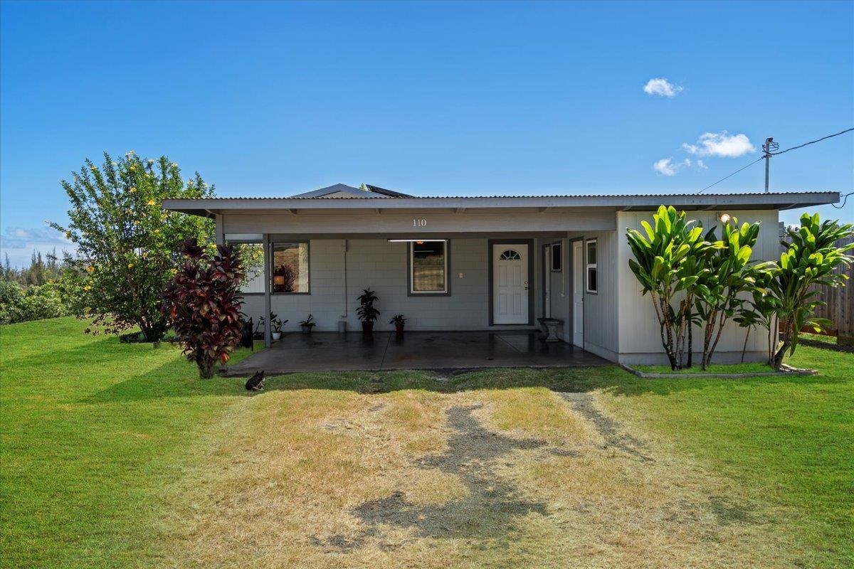 110 Kahiapo Place Haiku, HI 96708 - Photo 21 of 36 a view of a house with a yard porch and sitting area