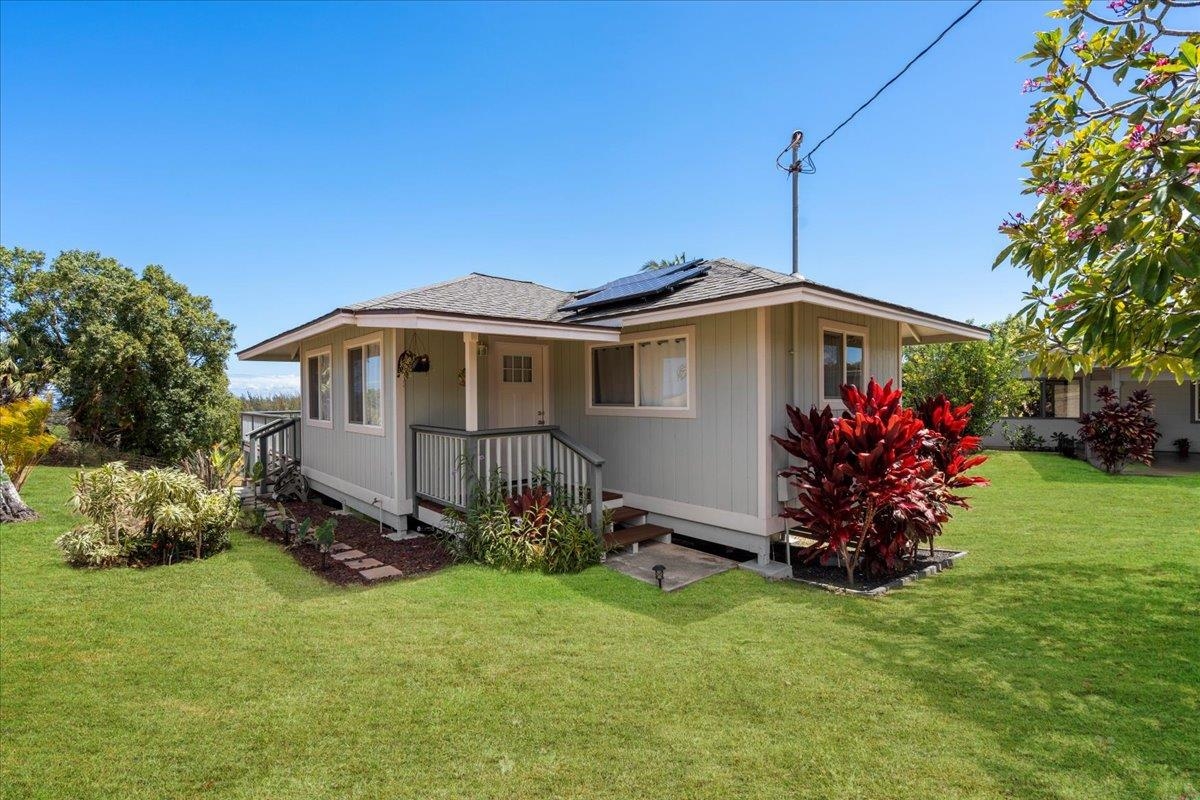110 Kahiapo Place Haiku, HI 96708 - Photo 24 of 36 a front view of a house with a yard
