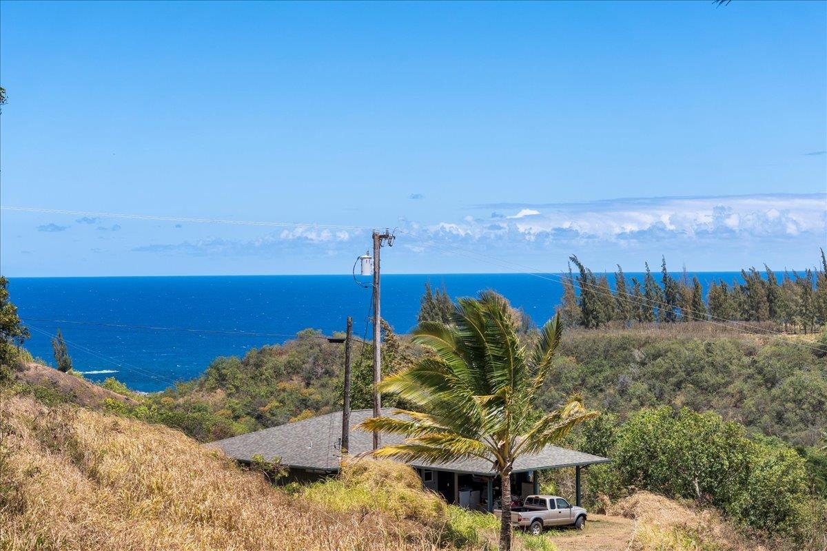 110 Kahiapo Place Haiku, HI 96708 - Photo 35 of 36 a view of a terrace with a table and chairs