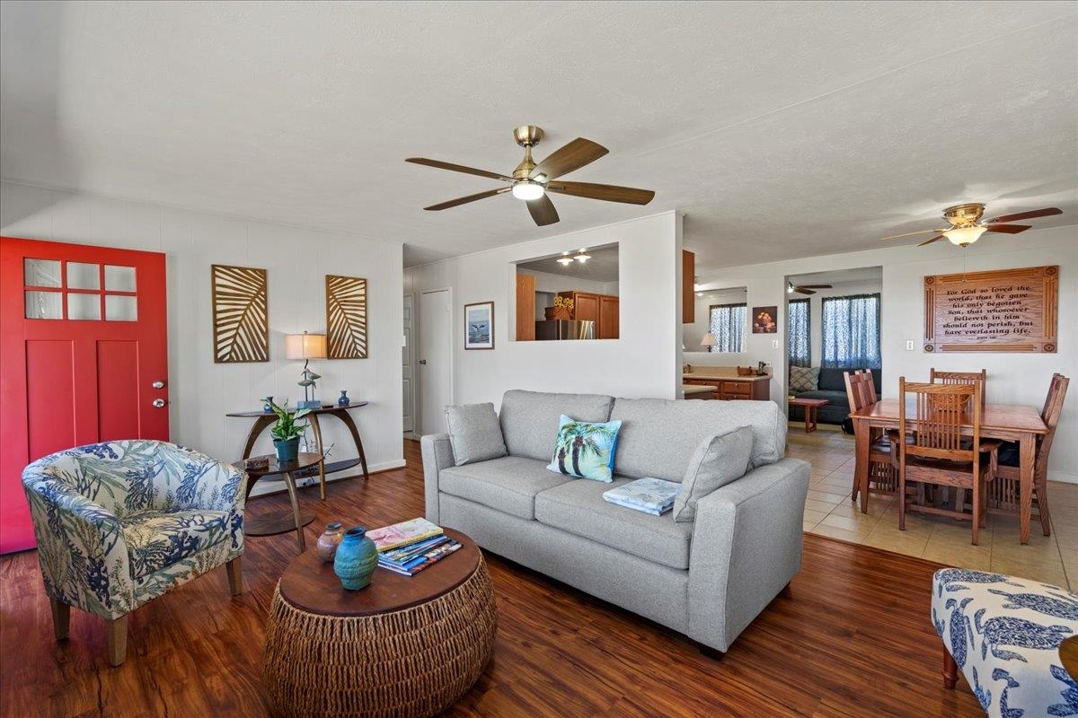 110 Kahiapo Place Haiku, HI 96708 - Photo 5 of 36 a living room with furniture and a wooden floor