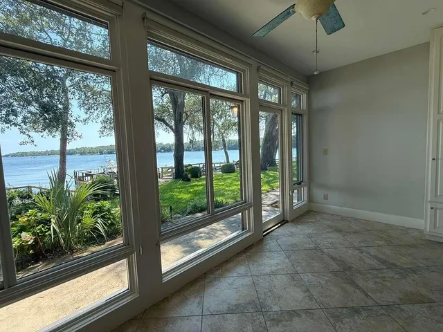 a view of room with window and floor to ceiling window