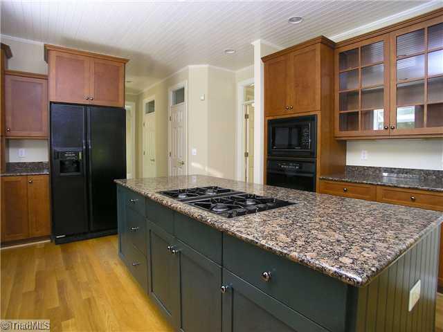 6102 Gwynedd Road Summerfield, NC 27358 - Photo 4 of 16 Kitchen. Large Kitchen With Island