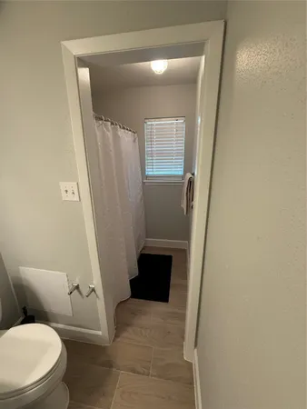 a bathroom with a sink and toilet