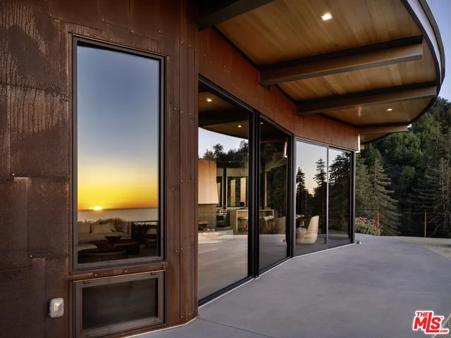 a view of a entryway door walk in closet