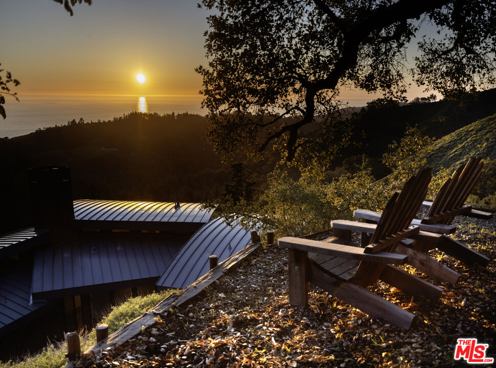 47730 Coast Ridge Road Big Sur, CA 93920 - Photo 36 of 37 a view of a balcony with chairs