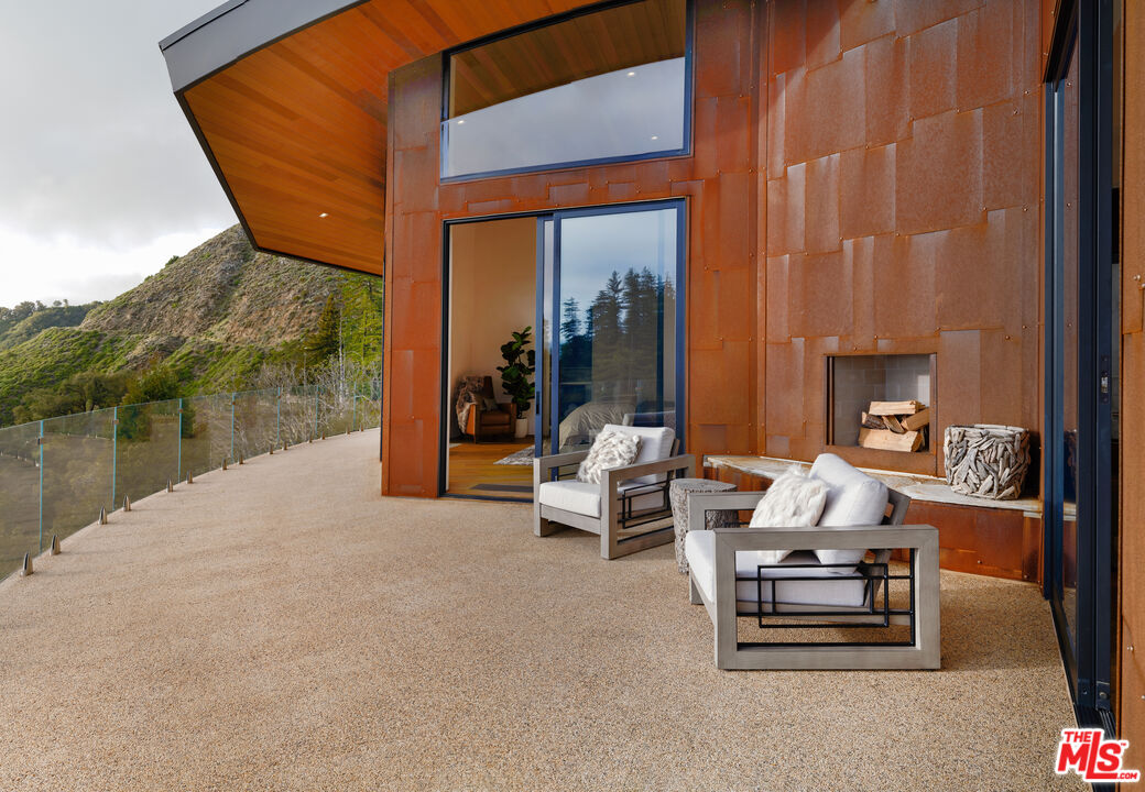 47730 Coast Ridge Road Big Sur, CA 93920 - Photo 6 of 37 a outdoor space with furniture