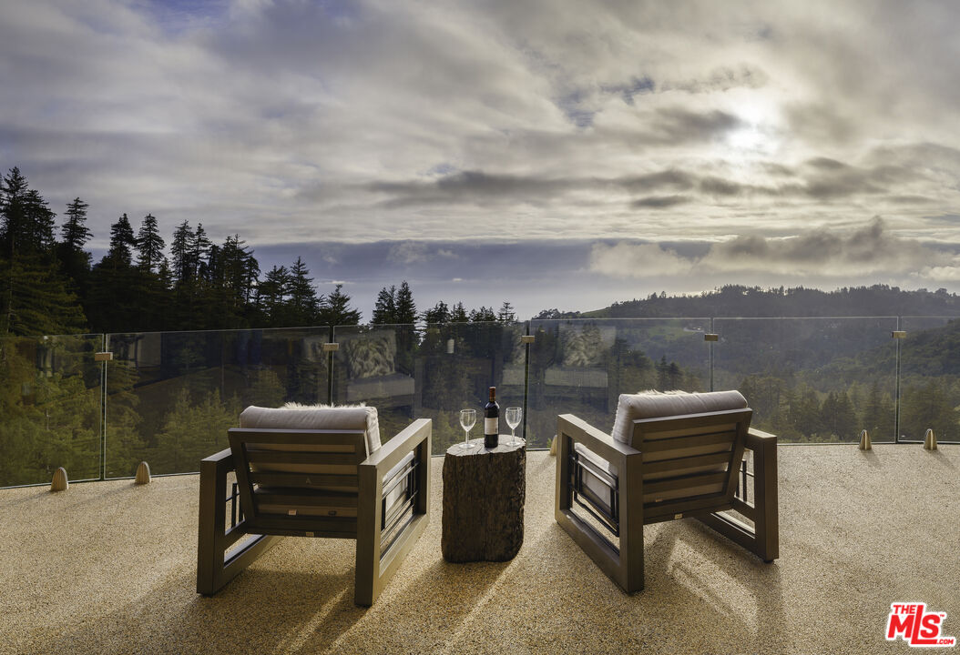 47730 Coast Ridge Road Big Sur, CA 93920 - Photo 7 of 37 a view of a lake with outdoor seating