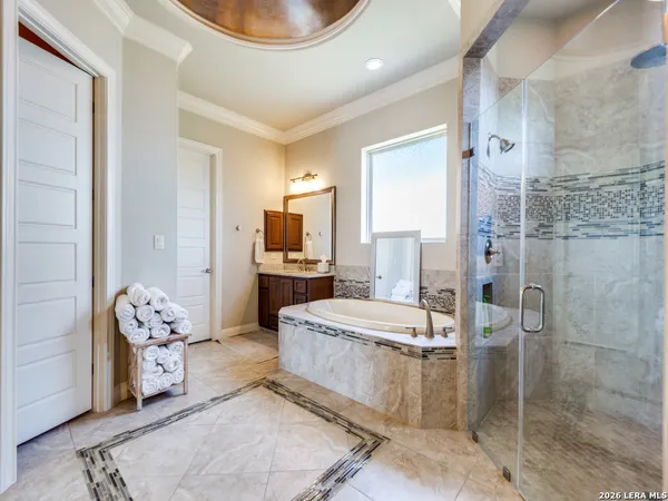 a living room with granite countertop furniture a fireplace and a table