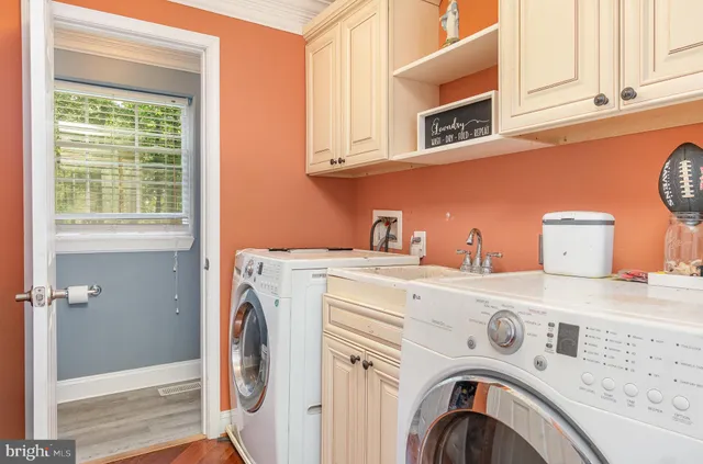 a bathroom with a toilet a sink and a bathtub