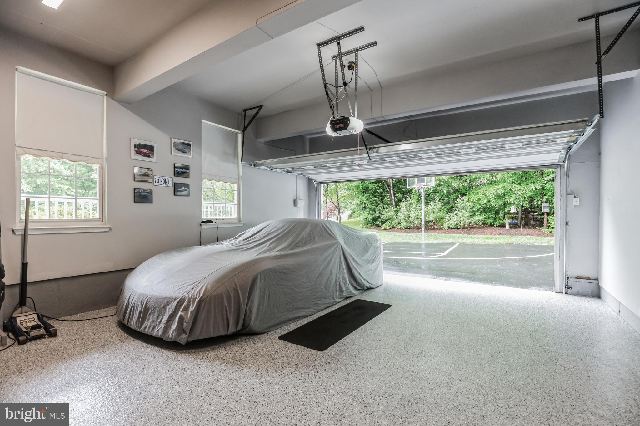 680 Small Reward Road Huntingtown, MD 20639 - Photo 24 of 40 a bedroom with a bed and a large window