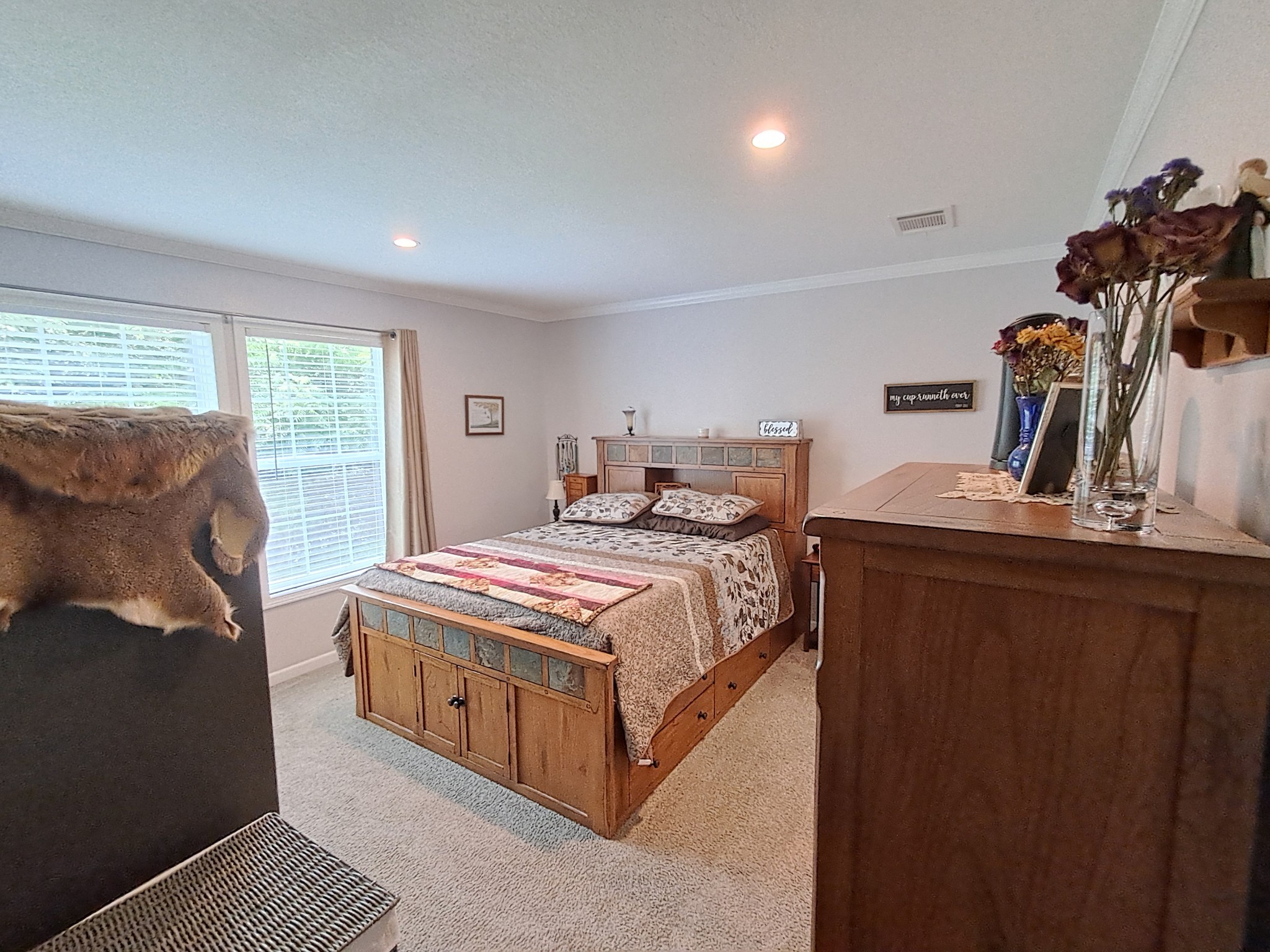 5525 Wiley Hollow Road Culleoka, TN 38451 - Photo 40 of 64 a bedroom with a bed and a dresser