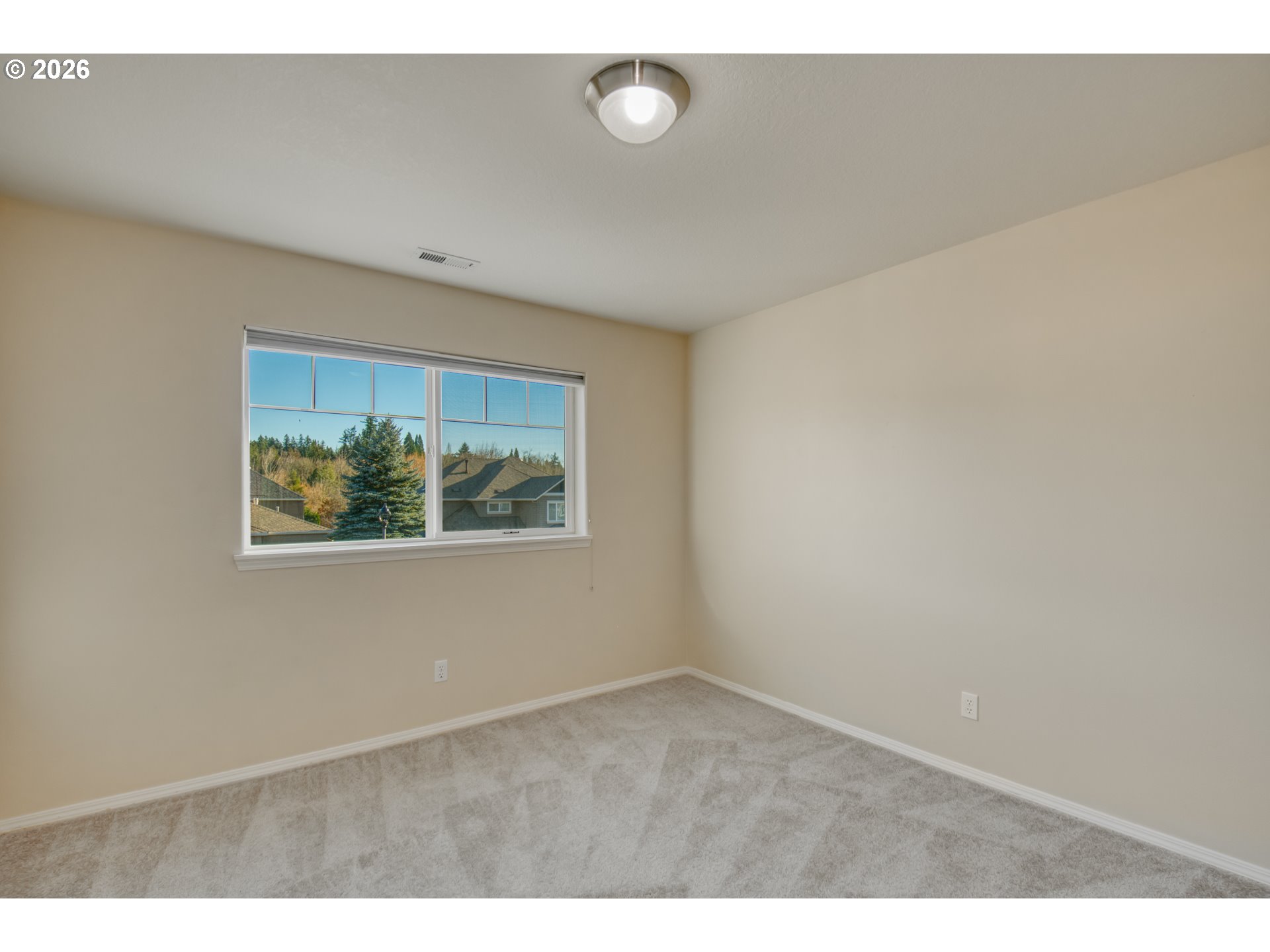 3637 Northwest Lansbrook Terrace Portland, OR 97229 - Photo 20 of 43 a view of an empty room with a window