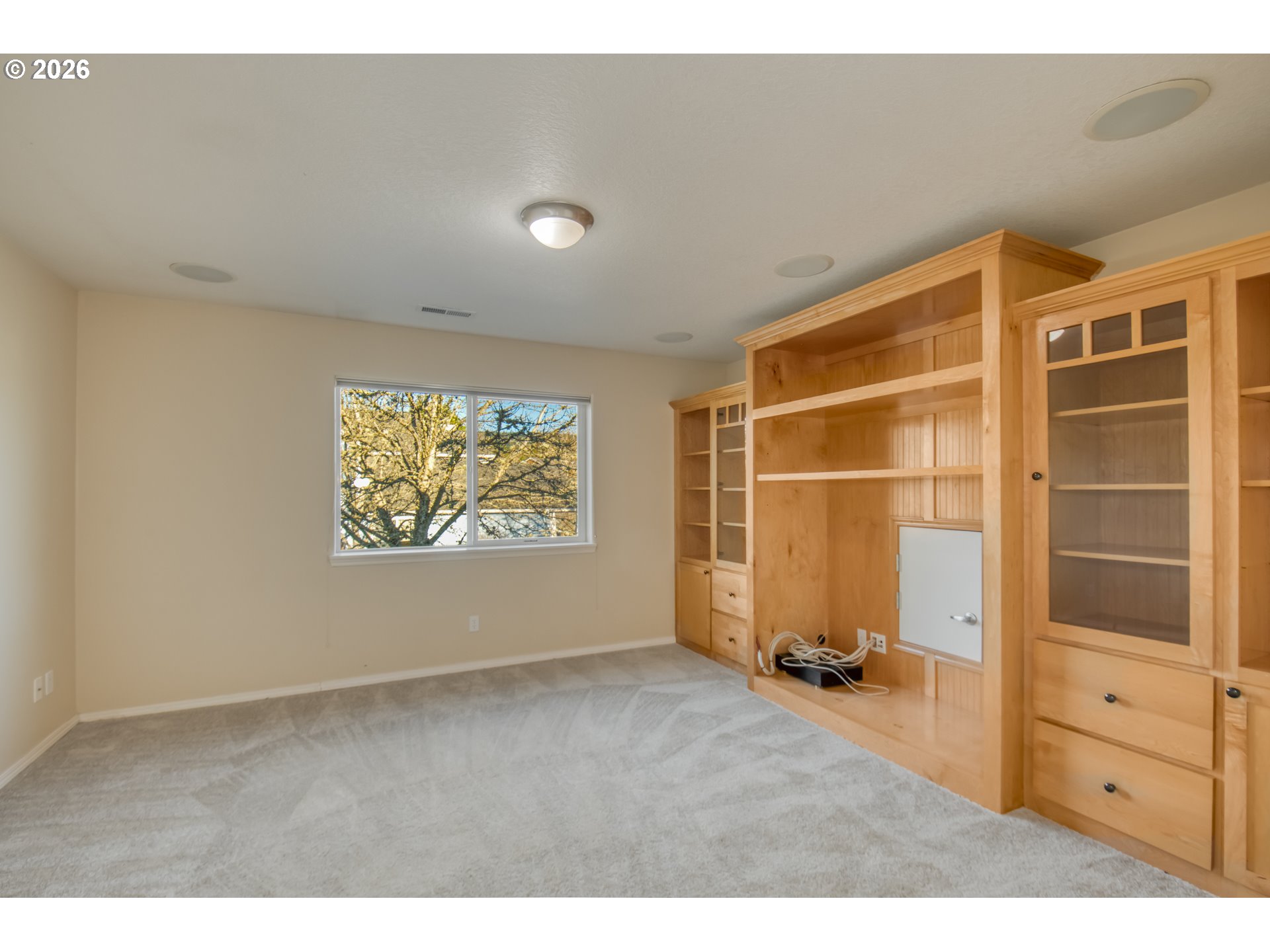 3637 Northwest Lansbrook Terrace Portland, OR 97229 - Photo 23 of 43 a view of an empty room with a window