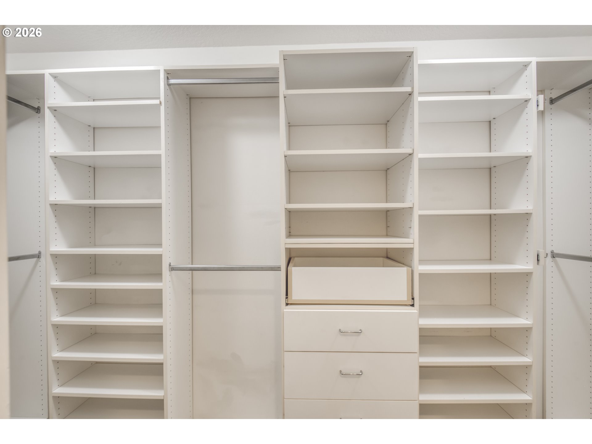 3637 Northwest Lansbrook Terrace Portland, OR 97229 - Photo 29 of 43 a view of walk in closet with empty racks