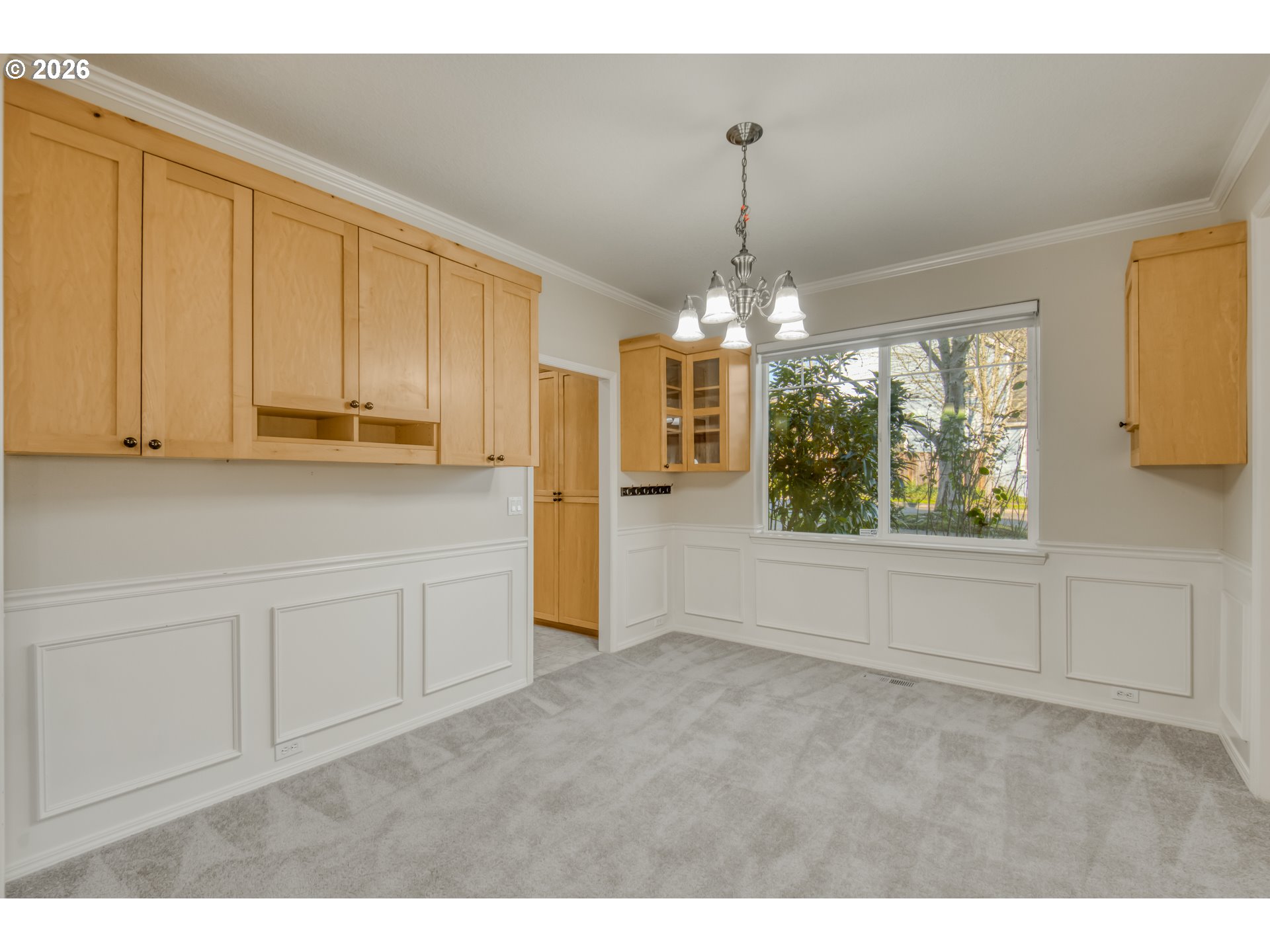 3637 Northwest Lansbrook Terrace Portland, OR 97229 - Photo 7 of 43 a view of a kitchen with cabinet and refrigerator