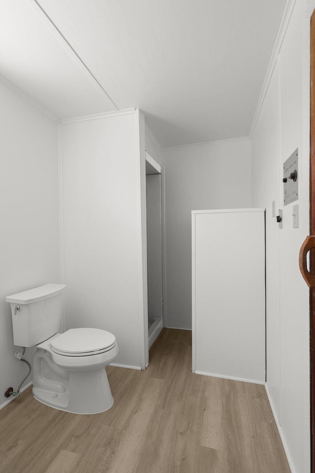 910 Hallmark Drive Redding, CA 96001 - Photo 25 of 40 a bathroom with a toilet and a shower