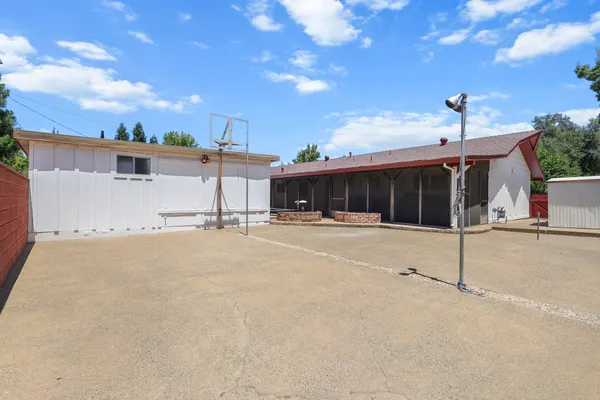 a view of a house with a street