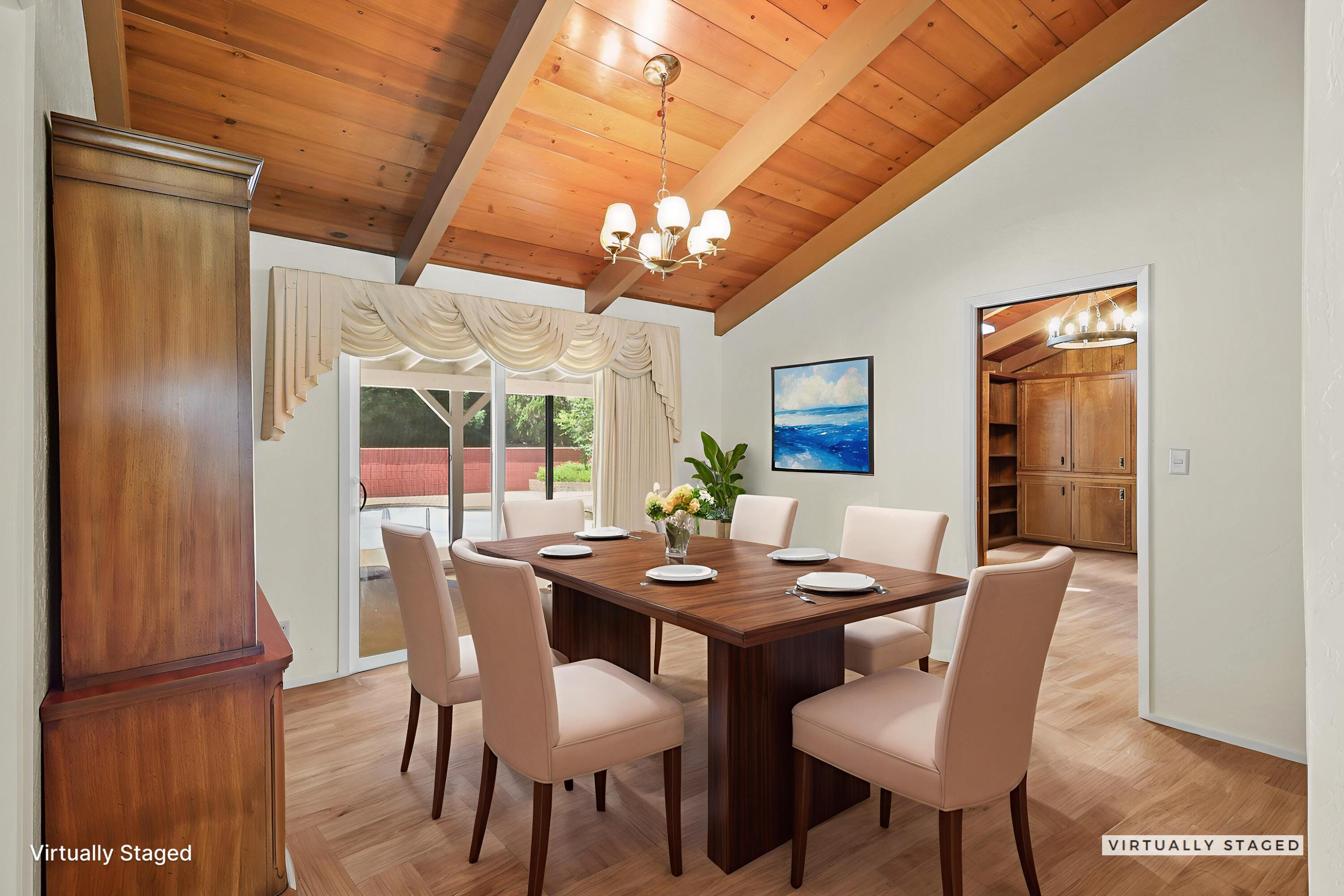 910 Hallmark Drive Redding, CA 96001 - Photo 5 of 40 a dining room with furniture a chandelier and window