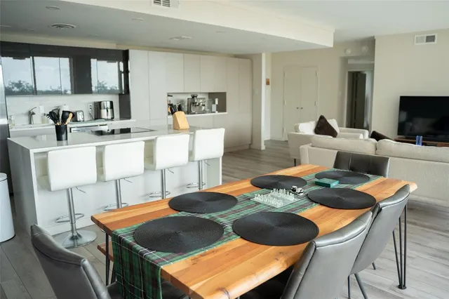 a view of a dining room with furniture