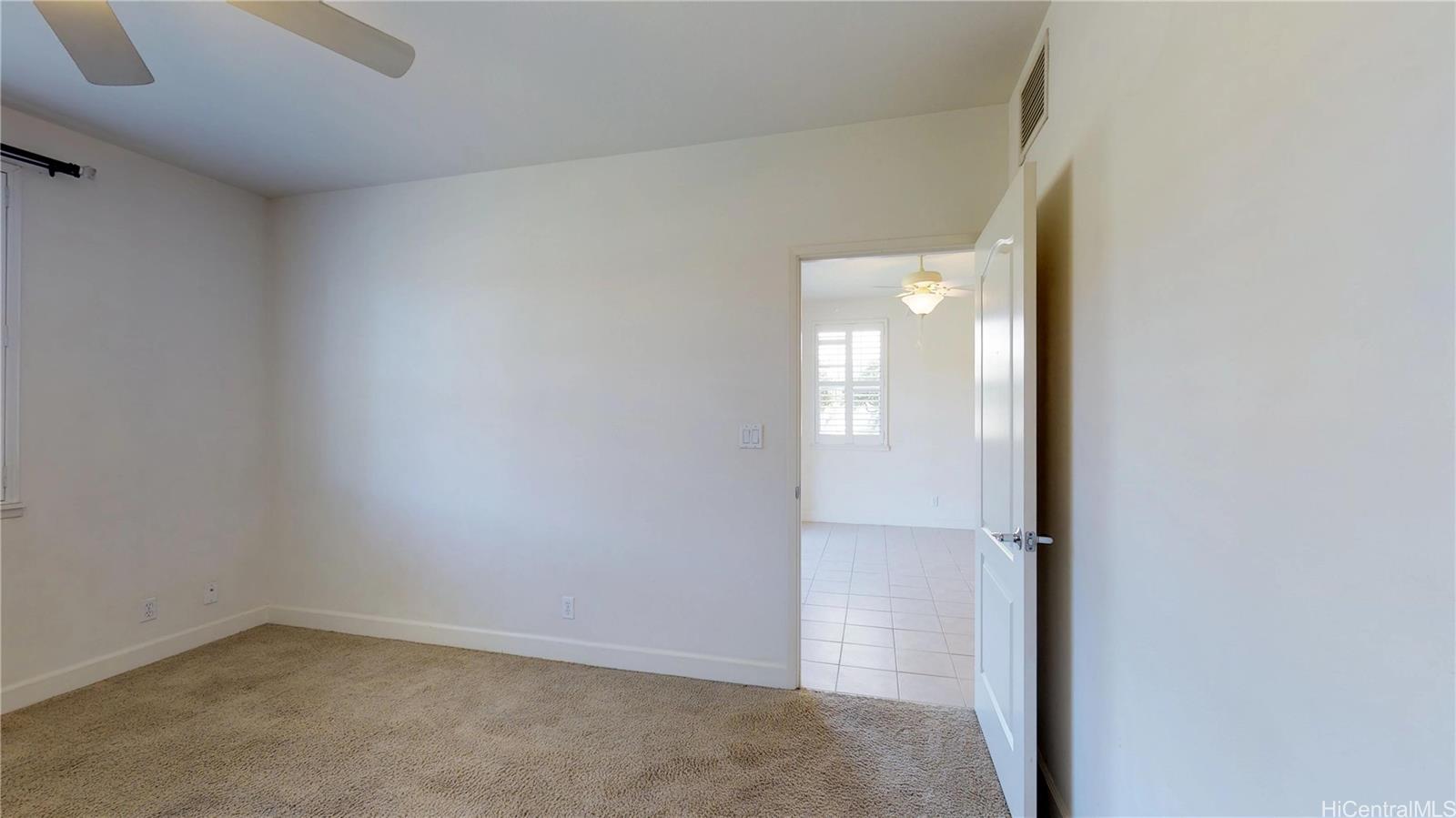 92-1033 Koio Drive, Unit M156 Kapolei, HI 96707 - Photo 13 of 20 a view of empty room