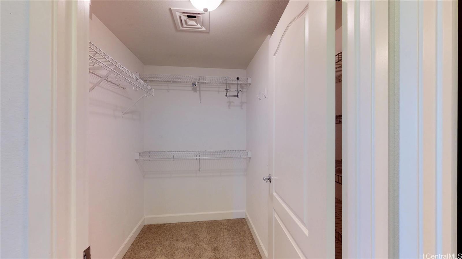 92-1033 Koio Drive, Unit M156 Kapolei, HI 96707 - Photo 15 of 20 a view of walk in closet