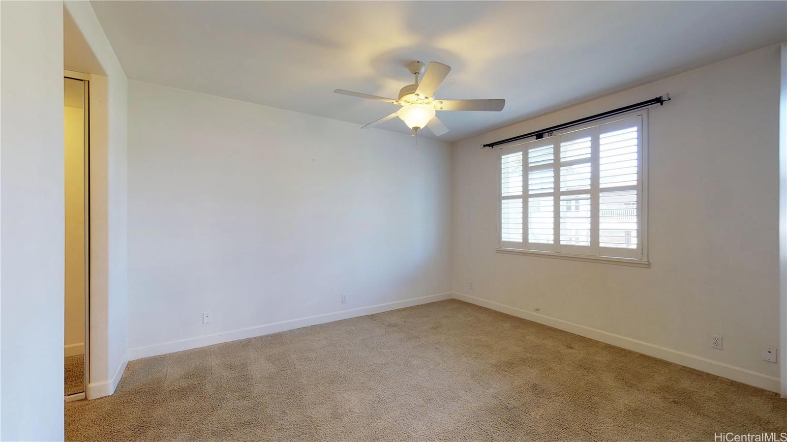 92-1033 Koio Drive, Unit M156 Kapolei, HI 96707 - Photo 17 of 20 an empty room with a window