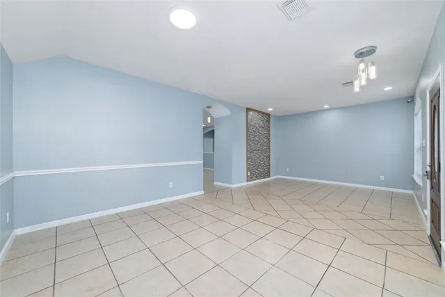 a view of an empty room and window