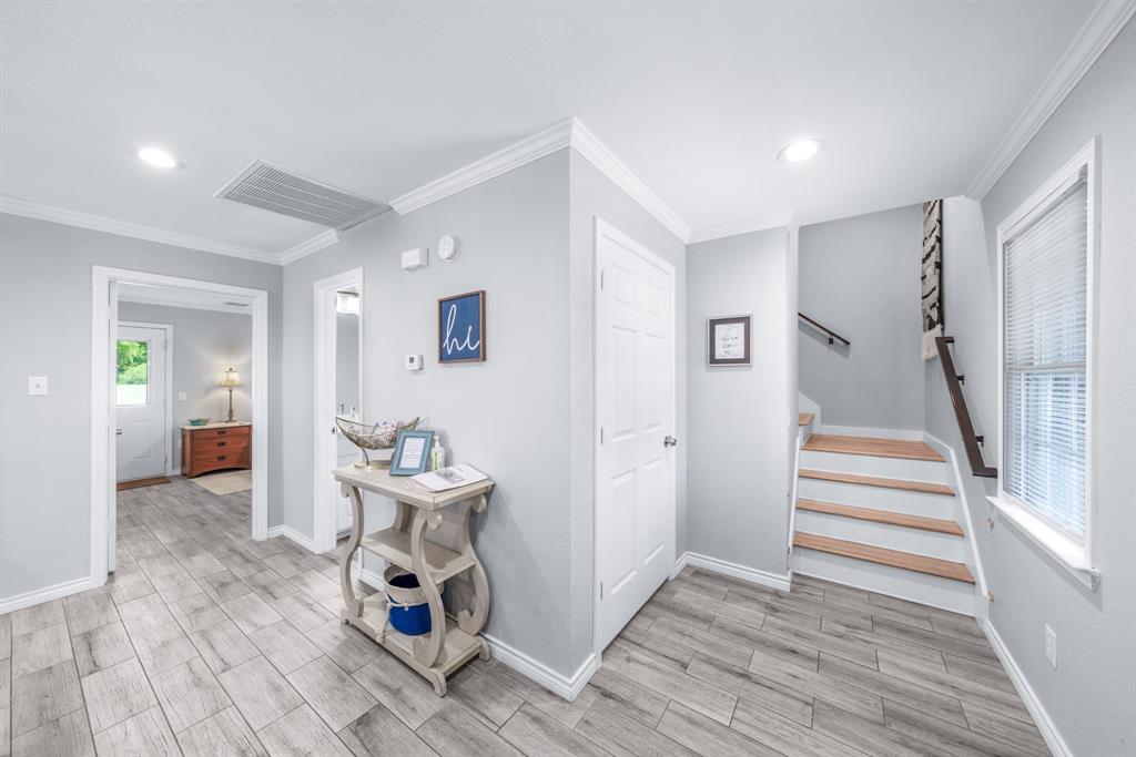 154 Wapiti Quitman, TX 75783 - Photo 15 of 31 a living room with furniture and a wooden floor